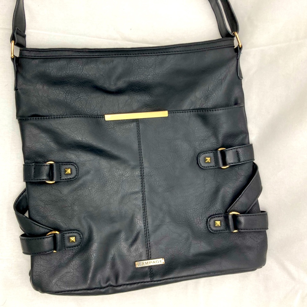 Rampage black cross-body bag with gold detailing and adjustable strap.